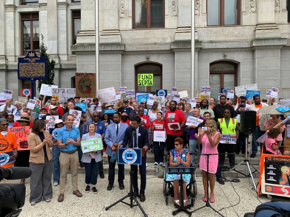 A few hundred SEPTA riders, activists and elected officials rallied outside City Hall on Aug. 6, 2025.