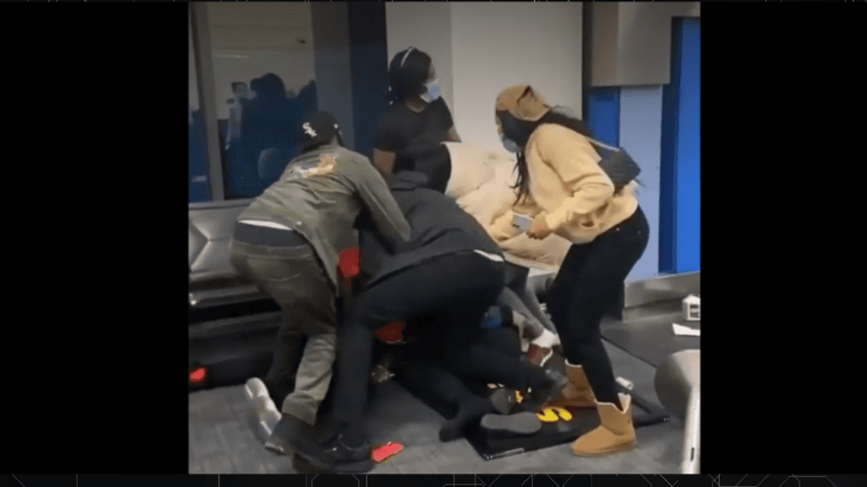 A fight at Detroit Metro Airport left two Spirit Airlines workers hospitalized