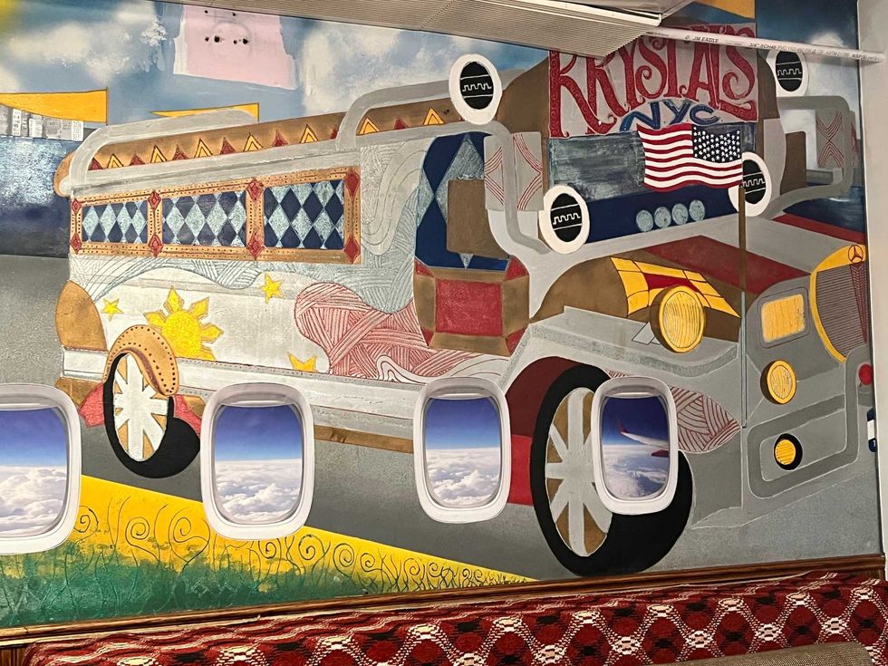 A Filipino American-themed mural inside Amazing Grace