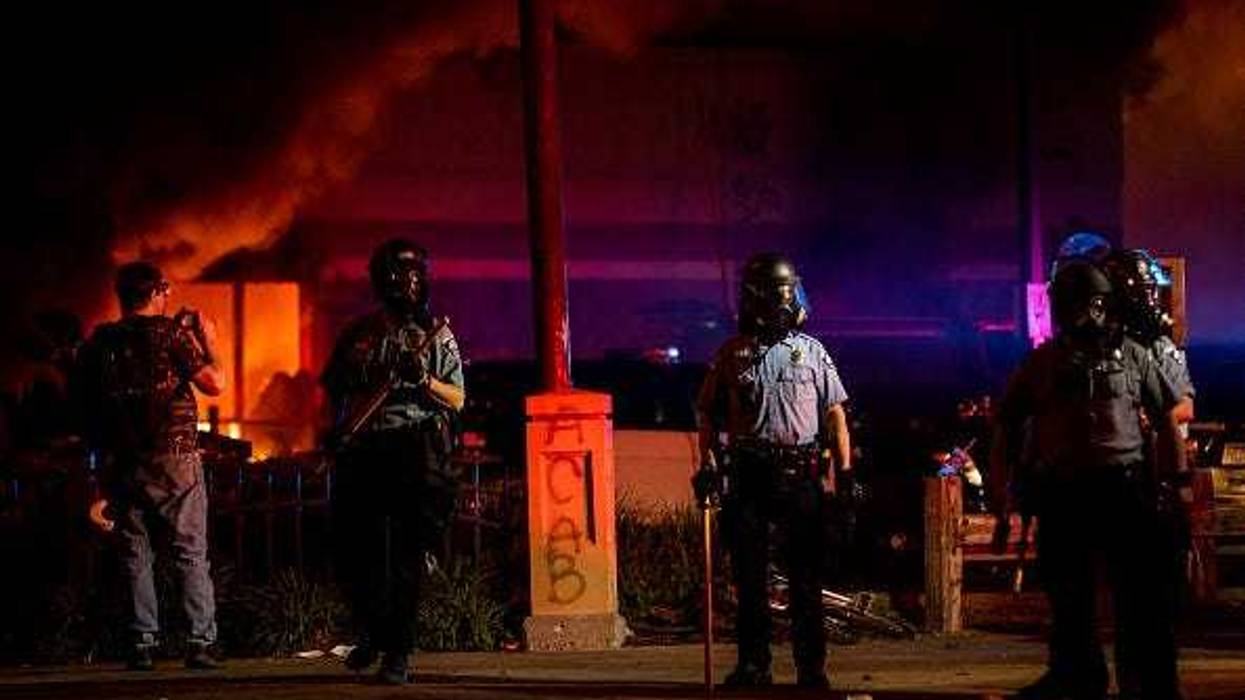 A fire burns inside of an Auto Zone store near the Third Police Precinct on May 27, 2020 in Minneapolis, Minnesota.