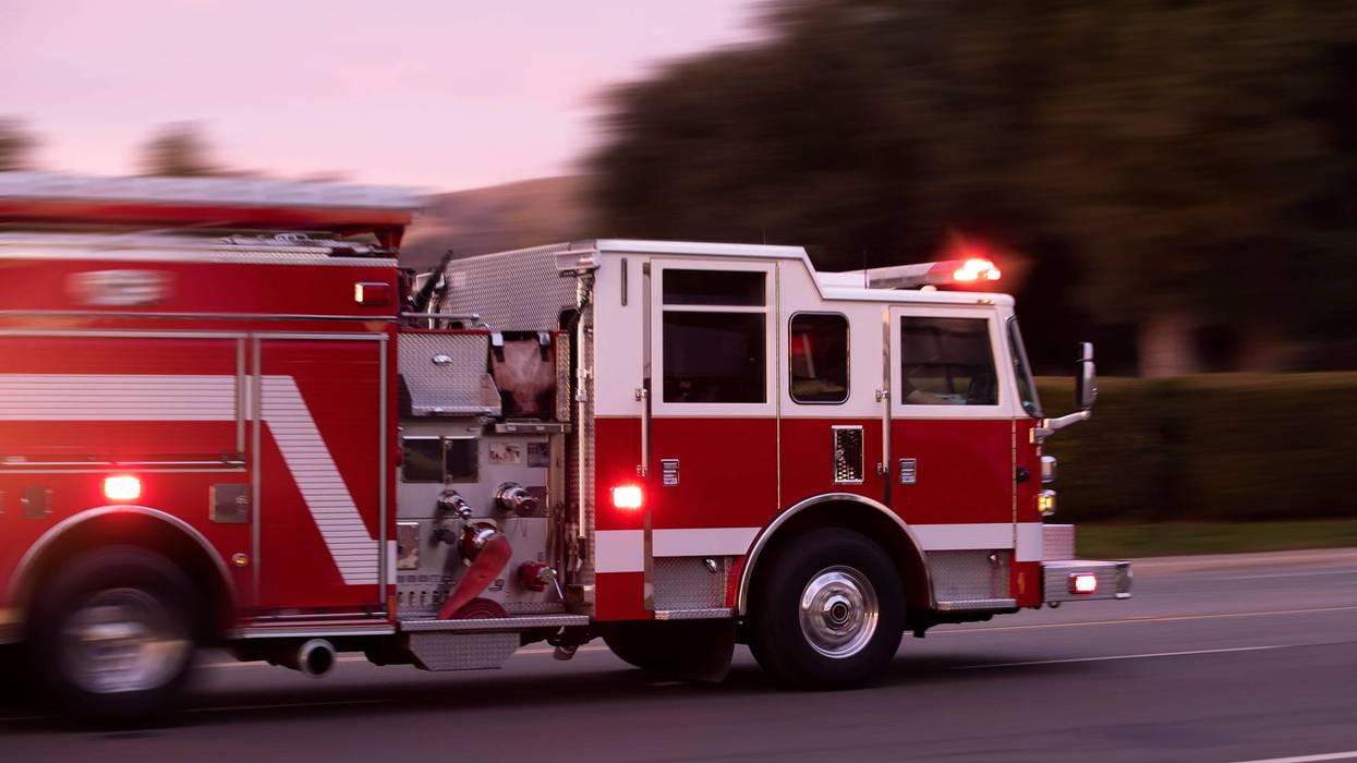 A fire engine races to the scene of an emergency.