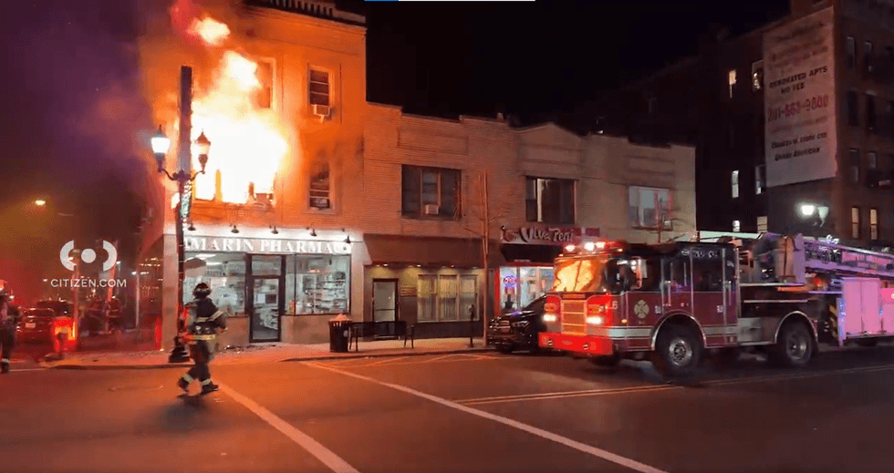 A fire on Thursday night injured eight firefighters and displaced residents in West New York, New Jersey on Nov. 23, 2023.