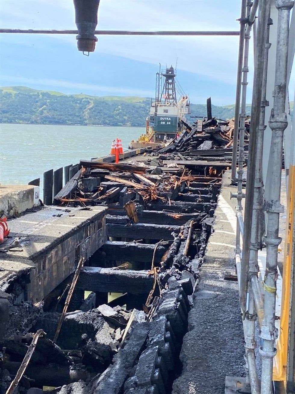 A fire that broke out at the Port of Benicia has been declared extinguished after burning for hours, destroying the dock and threatening to cause further damage in an area where gas and oil is offloaded.