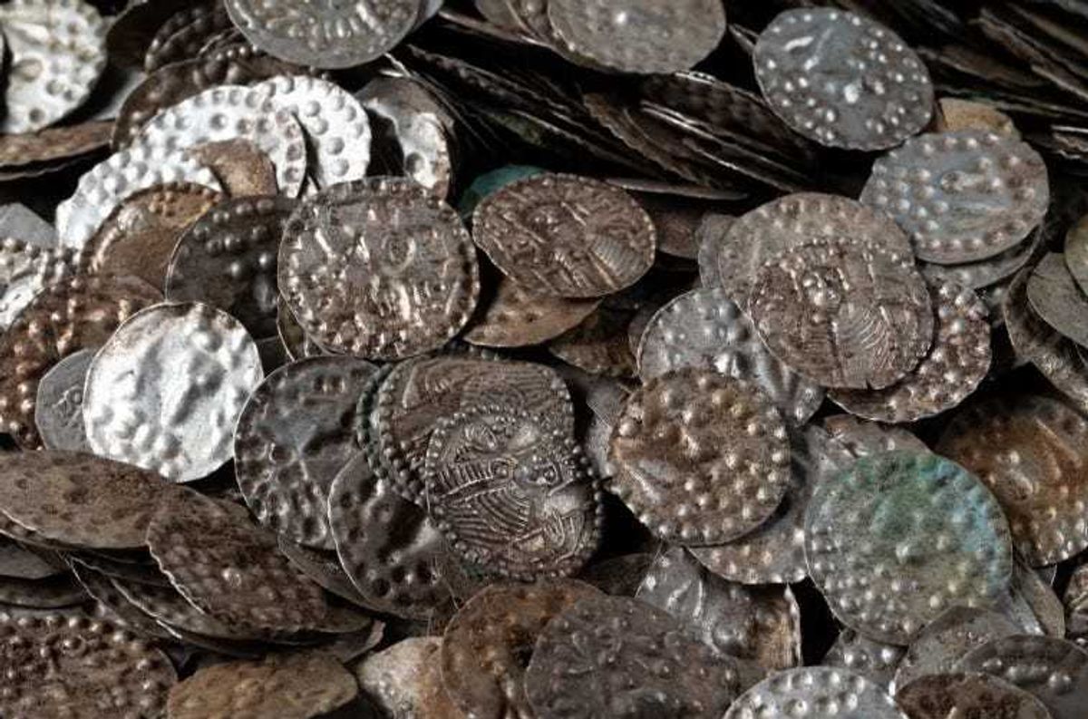 A fisherman in Sweden searching for bait worms near his summer cottage made a once-in-a-lifetime discovery — a massive medieval treasure hoard buried in the soil.
