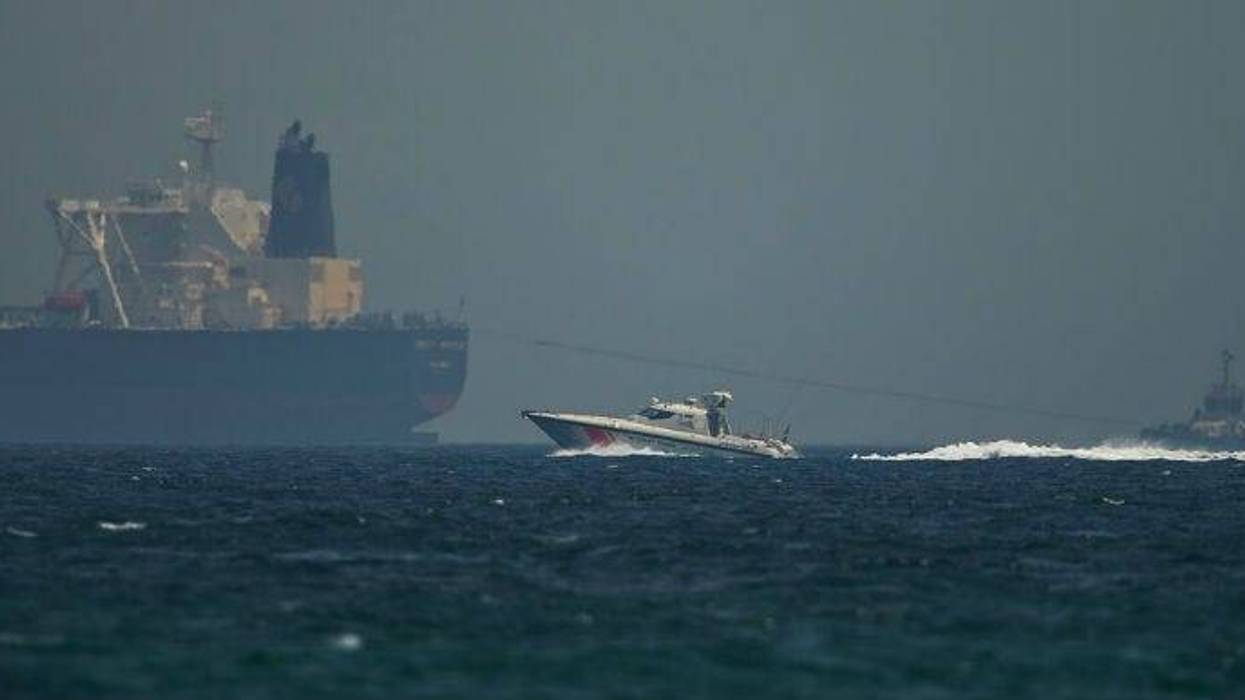 A fishing boat sails in waters off the coast of Fujairah, United Arab Emirates, Monday, May 13, 2019.