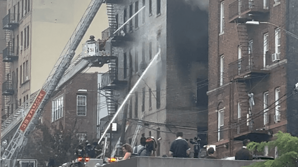 1 dead, 14 injured in 5-alarm Bronx fire sparked by apparent explosion