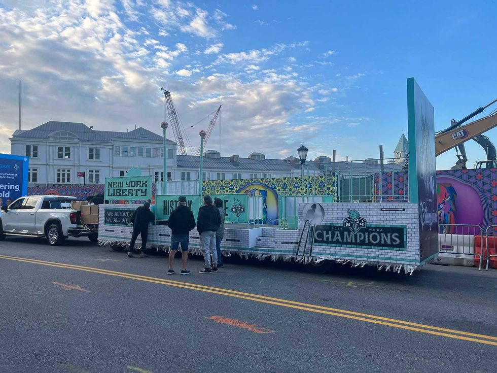A float is prepared ahead of the parade