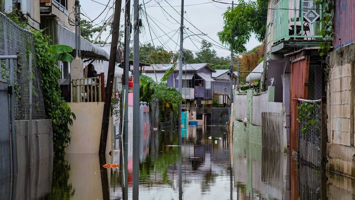 A flooded street is seen in the Juana Matos neighborhood of Catano, Puerto Rico, on September 19, 2022, after the passage of Hurricane Fiona.
