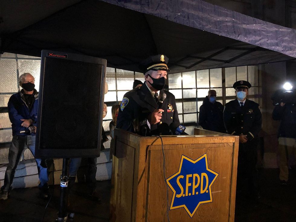 A former captain speaks at the memorial to honor fallen Officer James Guelff.