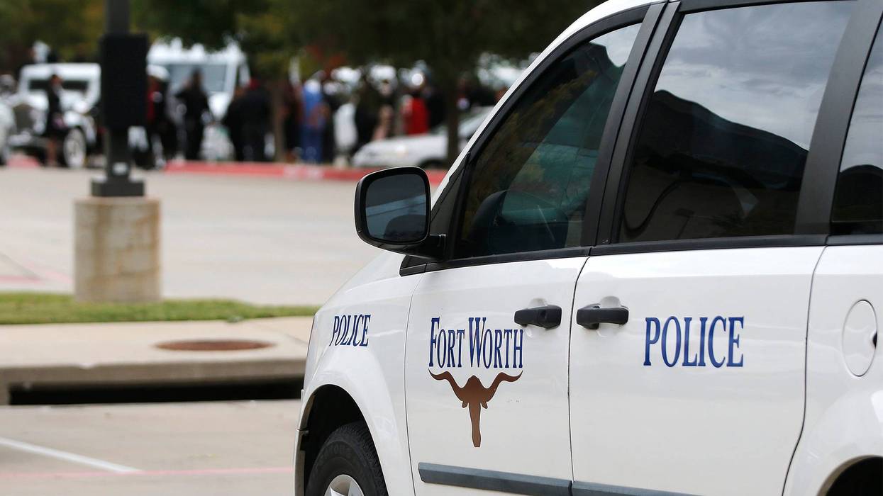 A Fort Worth Police car is parked outside the funeral service for Atatiana Jefferson on October 24, 2019, at Concord Church in Dallas, Texas. On October 12, 2019, Jefferson was at home with her nephew when Fort Worth police officer Aaron Y. Dean, who was responding to a non-emergency call, fired one shot through a window, killing her. Dean resigned from the department and was charged with murder. Some Fort Worth officers attended the funeral.