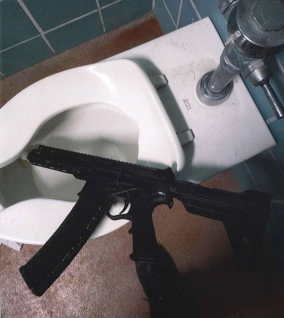 A gang member and an accomplice allegedly attempted to hide their weapons in a Kezar Stadium bathroom.