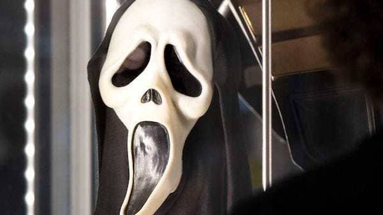 A Ghostface mask used in Scream at the Prop Store film memorabilia exhibition at the BFI IMAX at Waterloo in central London