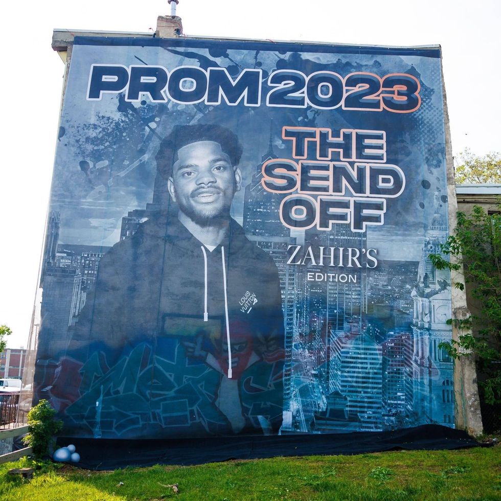 A giant mural-style banner with Zahir Harris