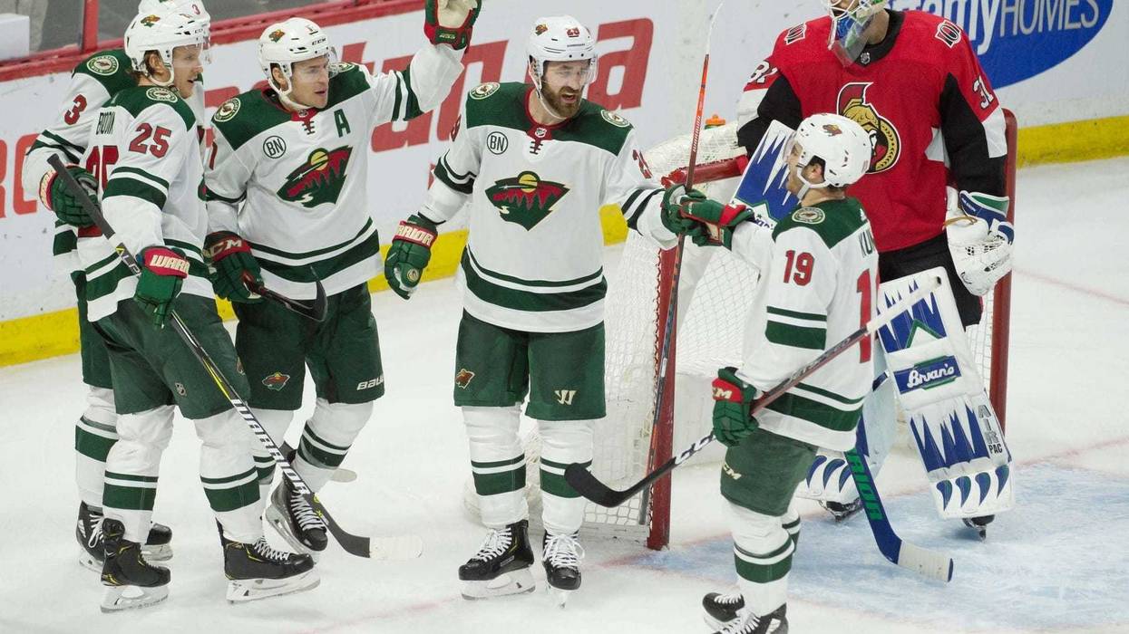 A goal is celebrated by Zach Parise and the Wild