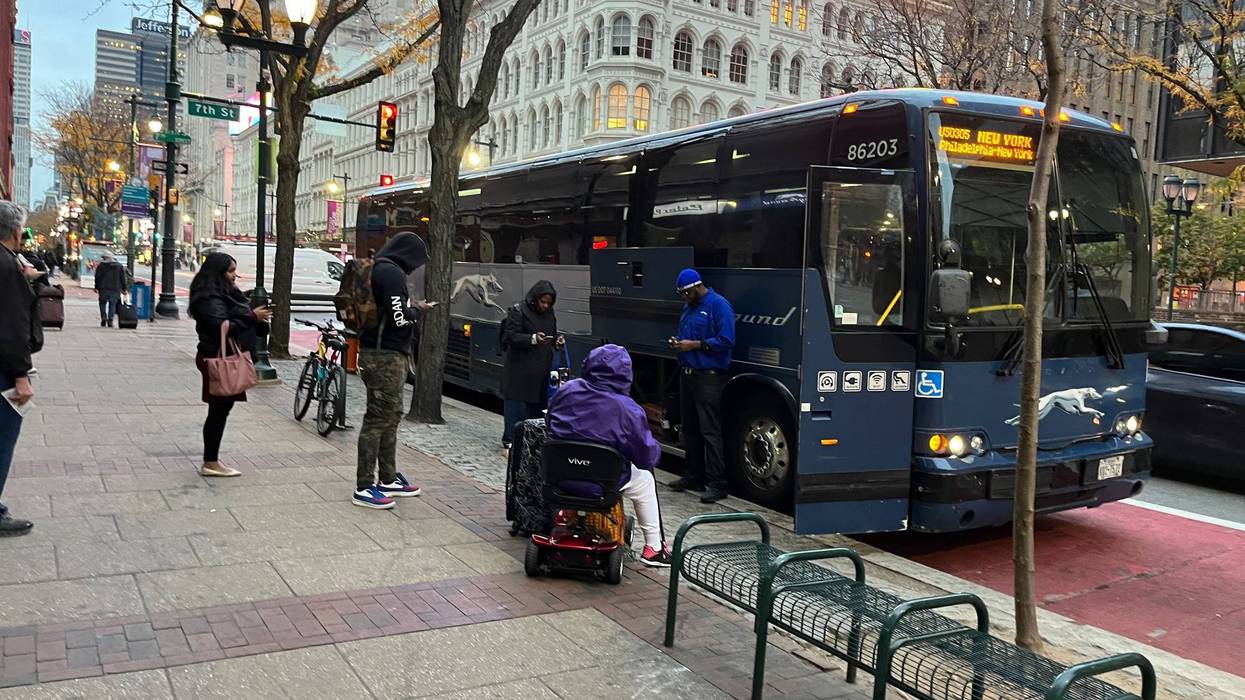 A Greyhound bus stops at Sixth and Market streets, Nov. 9, 2023.