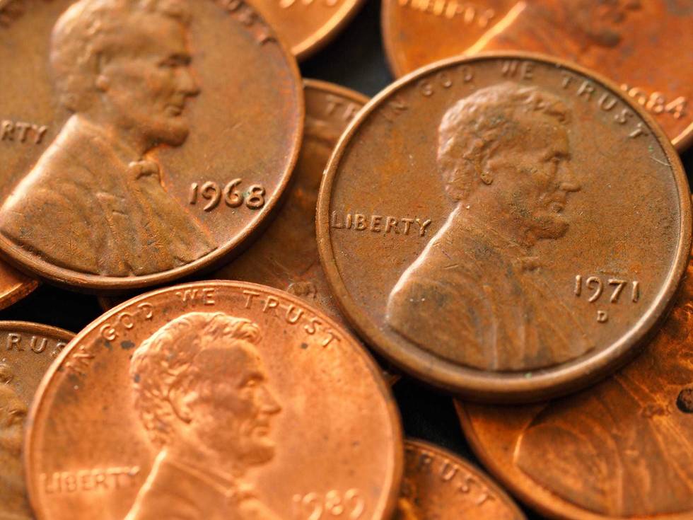 A group of 10 pennies that sold for more than $1 million at auction were much older than the ones in this photo.