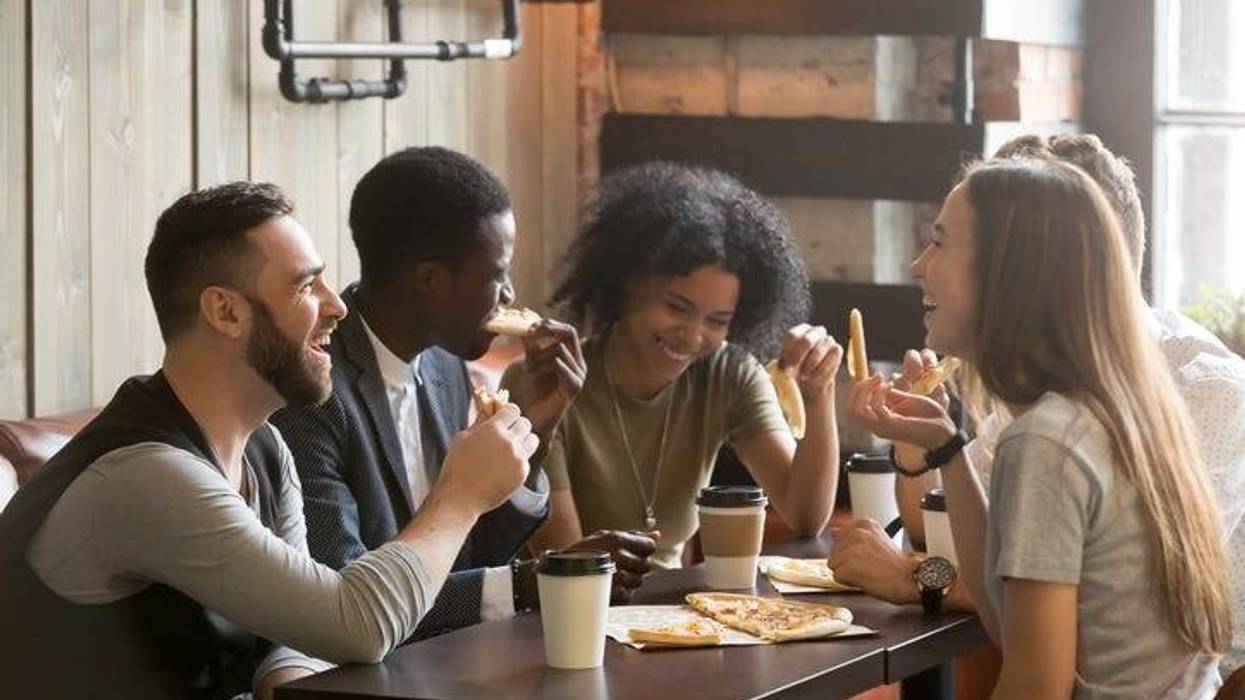 A group of friends having a meal together