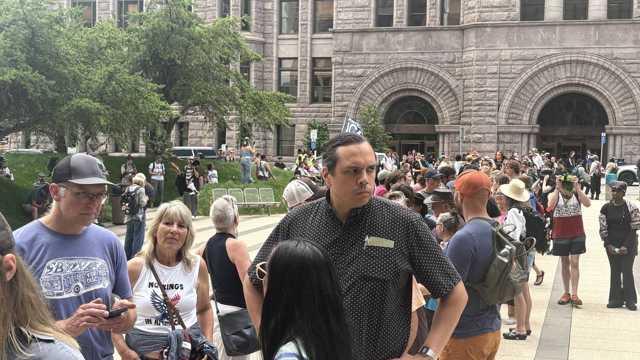 Group of ICE protesters in federal court facing arraignment as over a hundred supporters gather outside