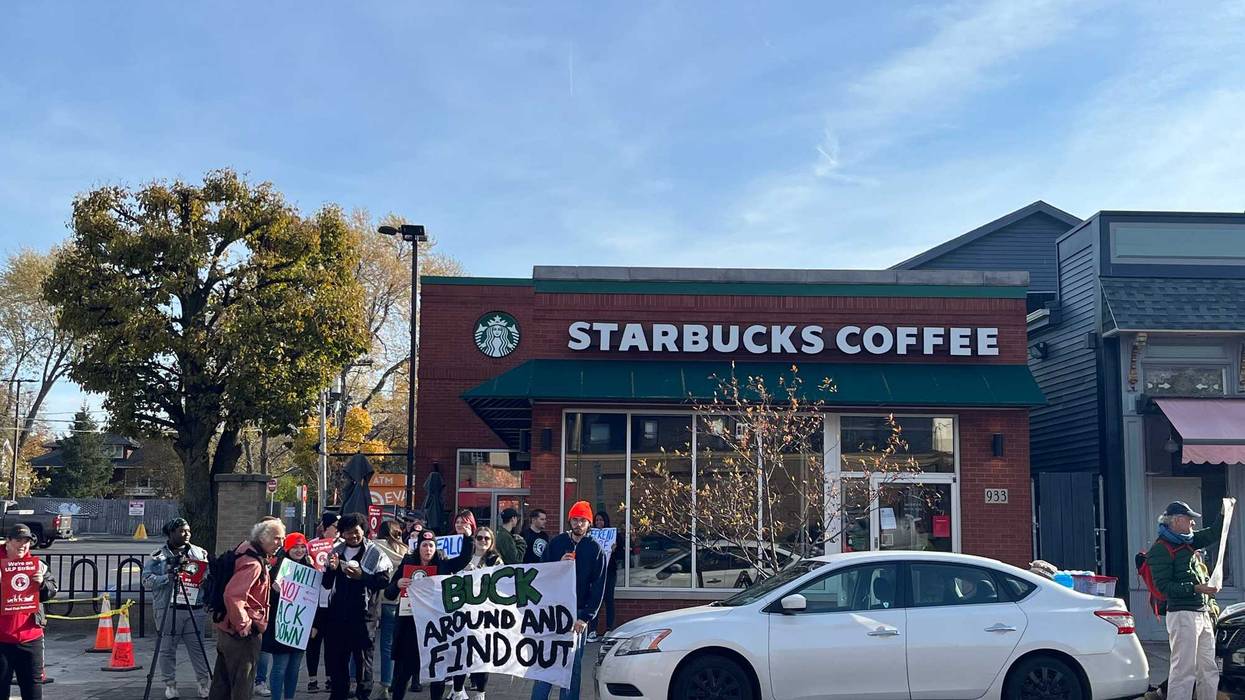 A group of Starbucks workers gather to strike at the first unionized Starbucks location on Elmwood Avenue in Buffalo, N.Y.