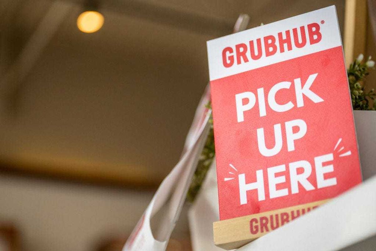 A Grubhub sign is seen in a Bubble Egg restaurant on July 07, 2022 in Houston, Texas. As of Wednesday, the premium service, called Grubhub, became a free perk for Amazon Prime members. (Photo by Brandon Bell/Getty Images)