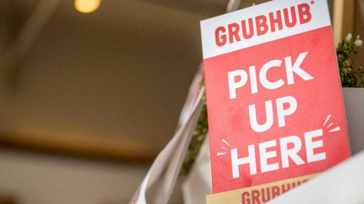 A Grubhub sign is seen in a Bubble Egg restaurant on July 07, 2022 in Houston, Texas. As of Wednesday, the premium service, called Grubhub, became a free perk for Amazon Prime members. (Photo by Brandon Bell/Getty Images)