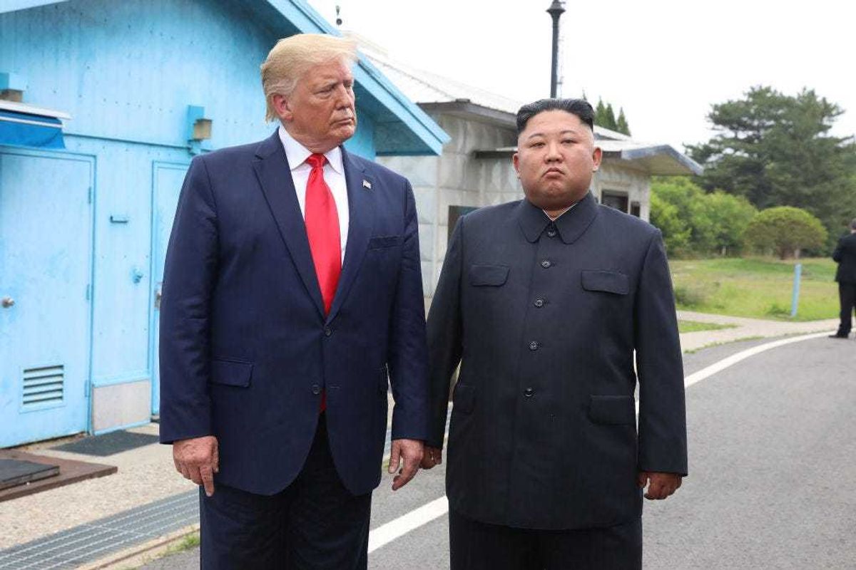 A handout photo provided by Dong-A Ilbo of North Korean leader Kim Jong Un and U.S. President Donald Trump inside the demilitarized zone (DMZ) separating the South and North Korea on June 30, 2019 in Panmunjom, South Korea. U.S. President Donald Trump and North Korean leader Kim Jong-un briefly met at the Korean demilitarized zone (DMZ) on Sunday, with an intention to revitalize stalled nuclear talks and demonstrate the friendship between both countries. The encounter was the third time Trump and Kim have gotten together in person as both leaders have said they are committed to the "complete denuclearization" of the Korean peninsula. (Handout photo by Dong-A Ilbo via Getty Images/Getty Images)