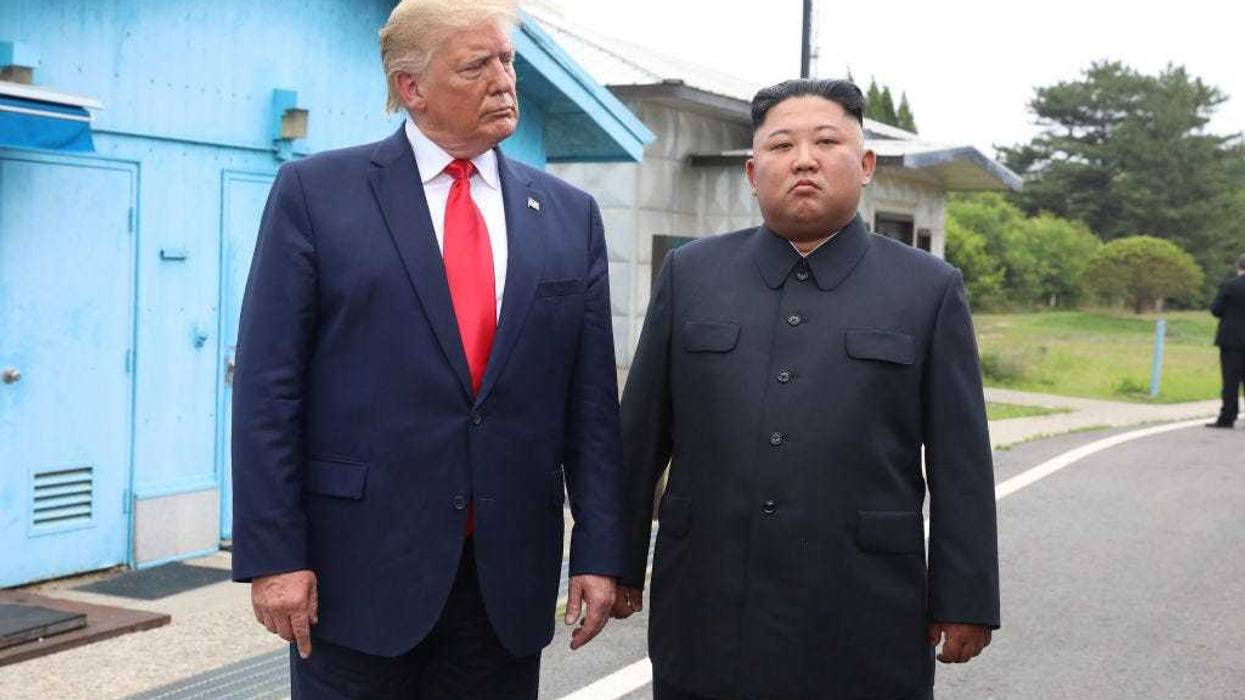 A handout photo provided by Dong-A Ilbo of North Korean leader Kim Jong Un and U.S. President Donald Trump inside the demilitarized zone (DMZ) separating the South and North Korea on June 30, 2019 in Panmunjom, South Korea. U.S. President Donald Trump and North Korean leader Kim Jong-un briefly met at the Korean demilitarized zone (DMZ) on Sunday, with an intention to revitalize stalled nuclear talks and demonstrate the friendship between both countries. The encounter was the third time Trump and Kim have gotten together in person as both leaders have said they are committed to the "complete denuclearization" of the Korean peninsula. (Handout photo by Dong-A Ilbo via Getty Images/Getty Images)
