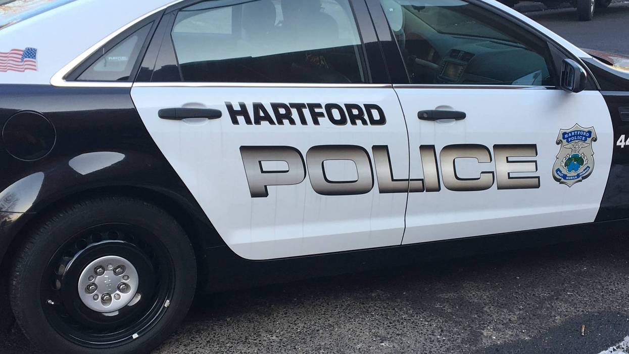 A Hartford police cruiser at an investigation scene