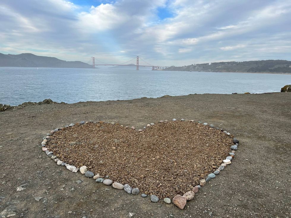 A heart overlooks the San Francisco Bay and Golden Gate Bridge at Lands End.