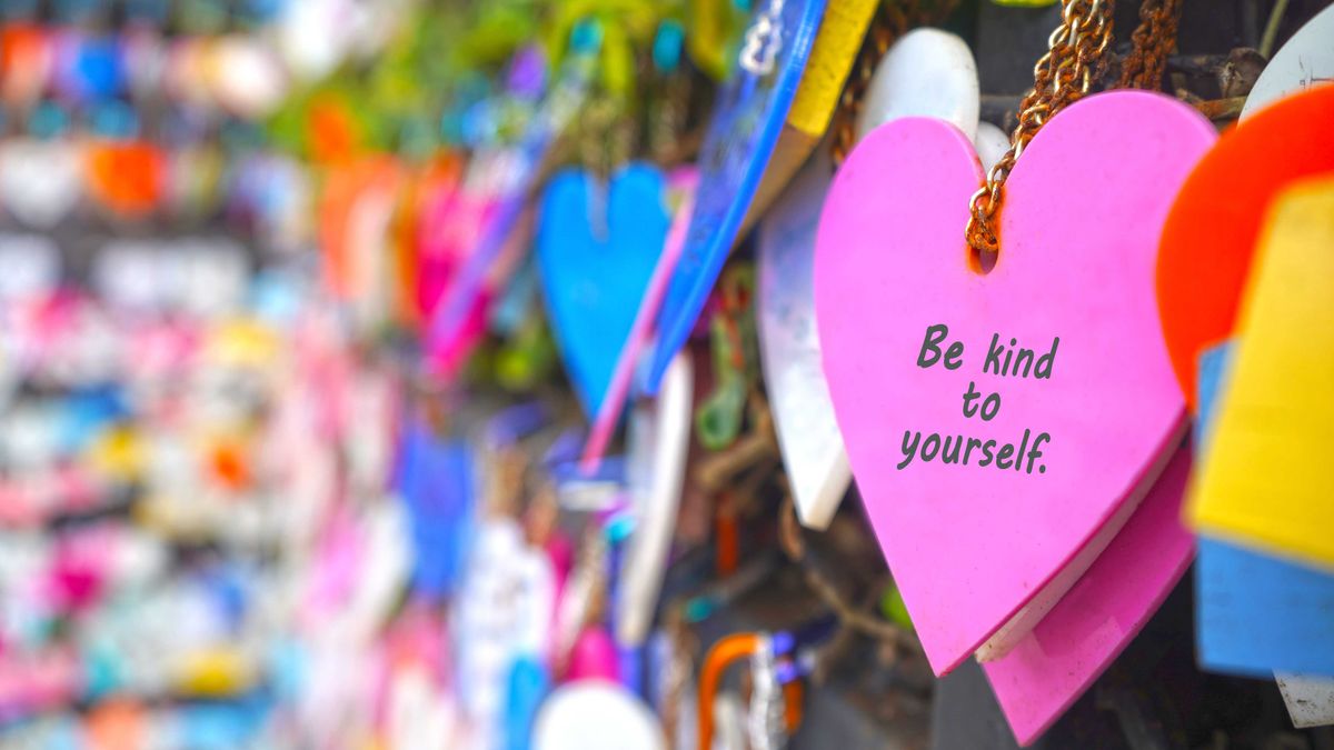 A heart reading "Be kind to yourself"