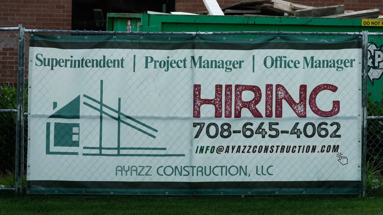 U.S. filings for jobless aid fall to 215,000 as layoffs remain at historically healthy levels