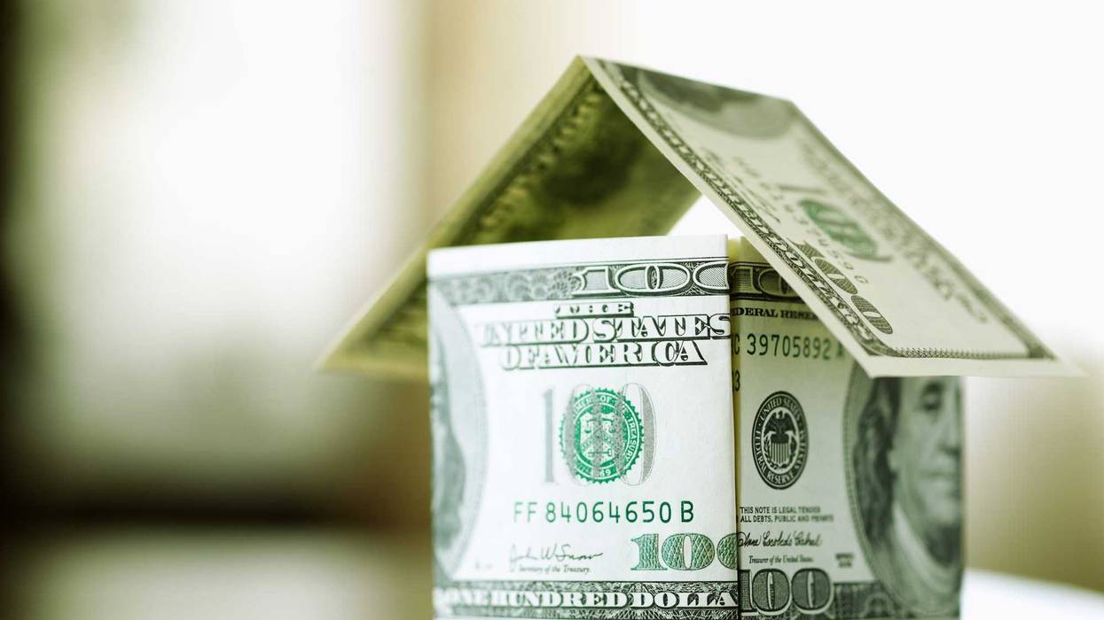 A home made of hundred dollar bills.