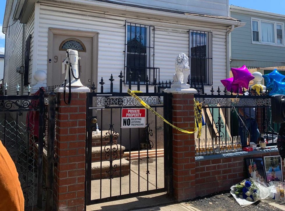 A home where a mother and her adult son drowned in a basement apartment in Jamaica, Queens