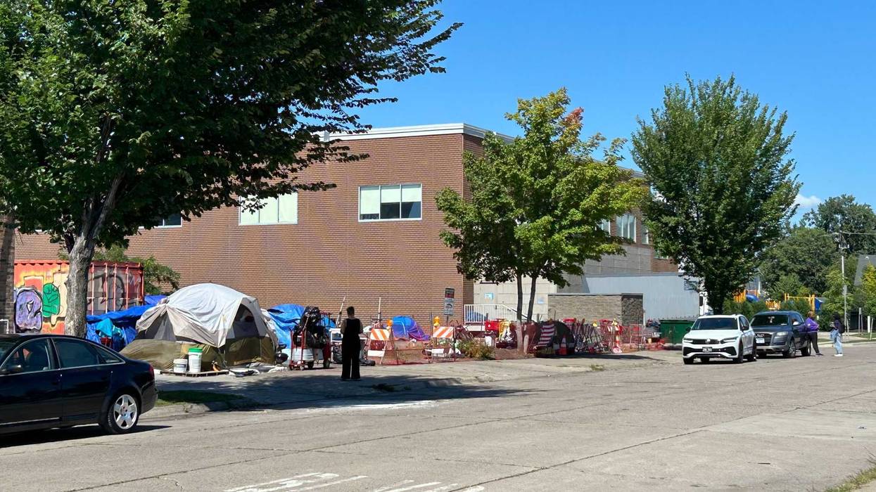 A homeless encampment in Minneapolis that's on privately owned land on East Lake Street is setting up a showdown between the owner and the city.