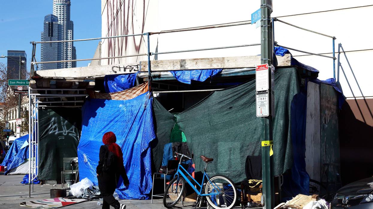 A homeless encampment lines a sidewalk in the Skid Row community on December 14, 2022 in Los Angeles, California.