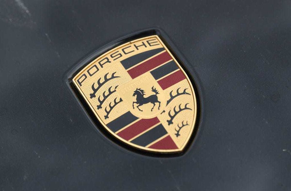 A hood ornament shows the Porsche logo on a Porsche Cayenne diesel SUV parked on June 13, 2017 in Berlin, Germany.
