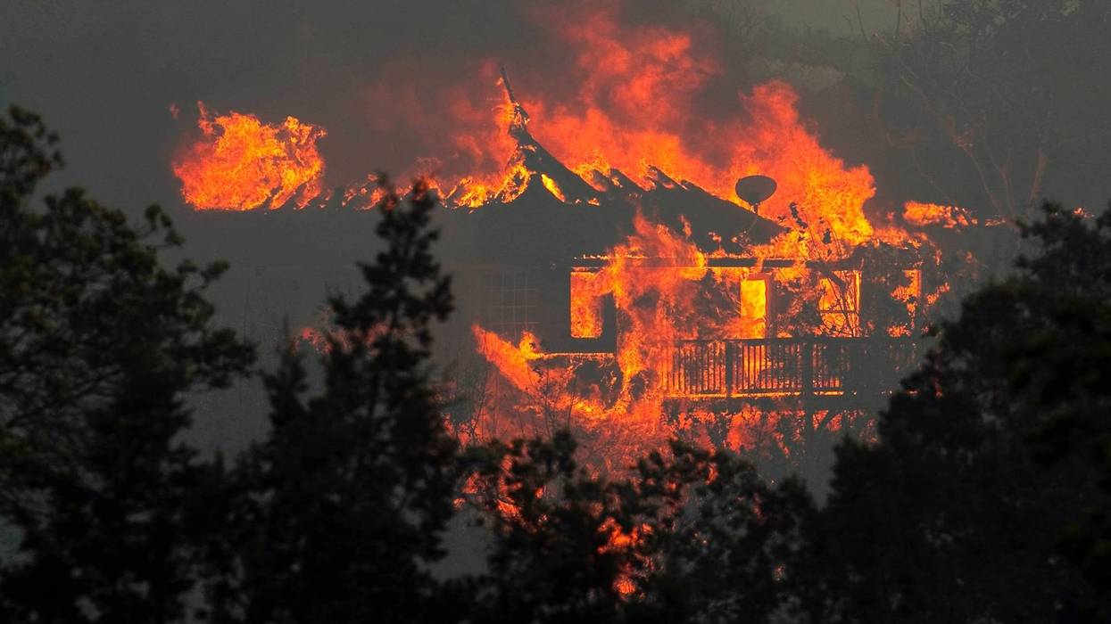A house burns to the ground in the Steiner Ranch neighborhood in Austin Sept. 4, 2011.