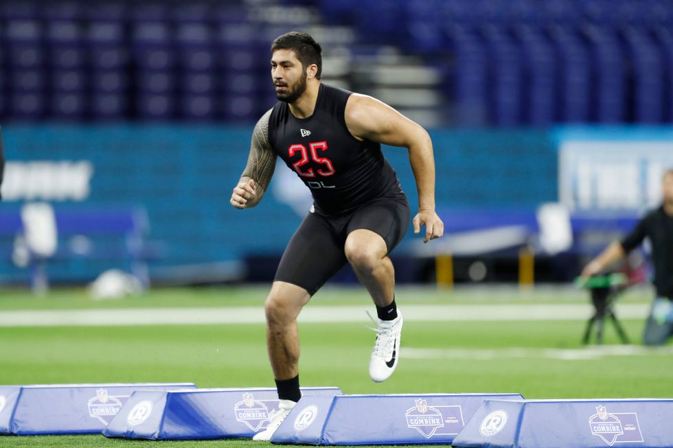 A.J. Epenesa shows off his lateral movement at the NFL Scouting Combine.