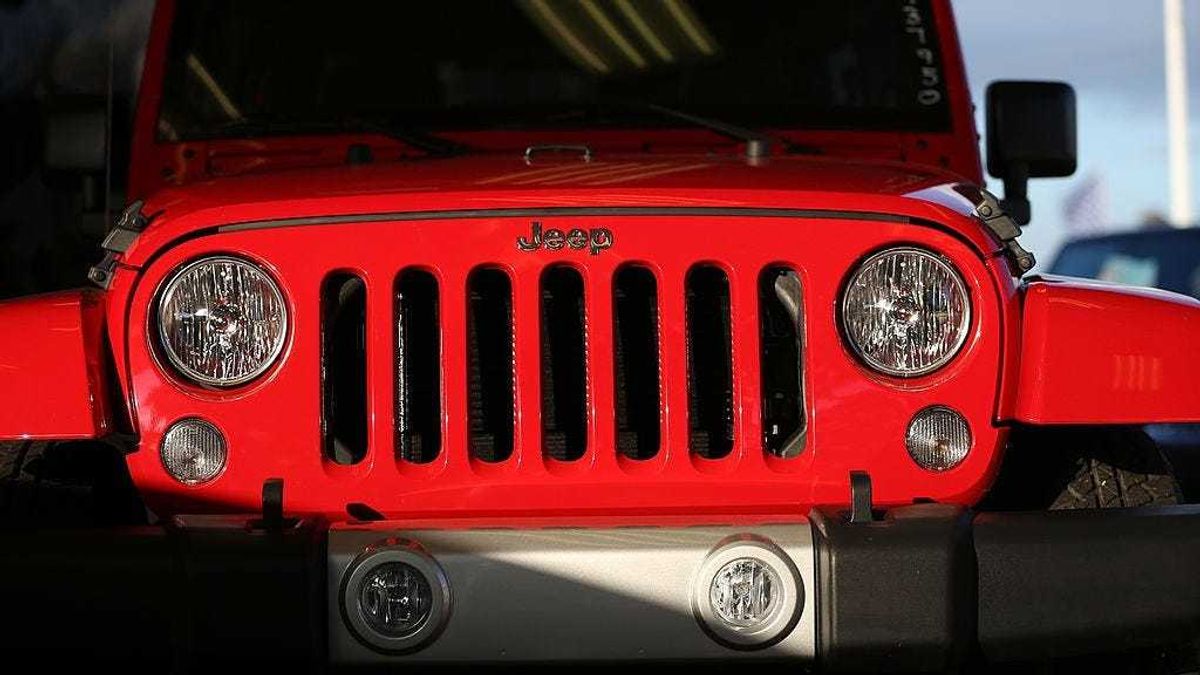 A Jeep Wrangler is displayed at the Hollywood Chrysler Jeep dealership on December 3, 2013 in Hollywood, Florida.