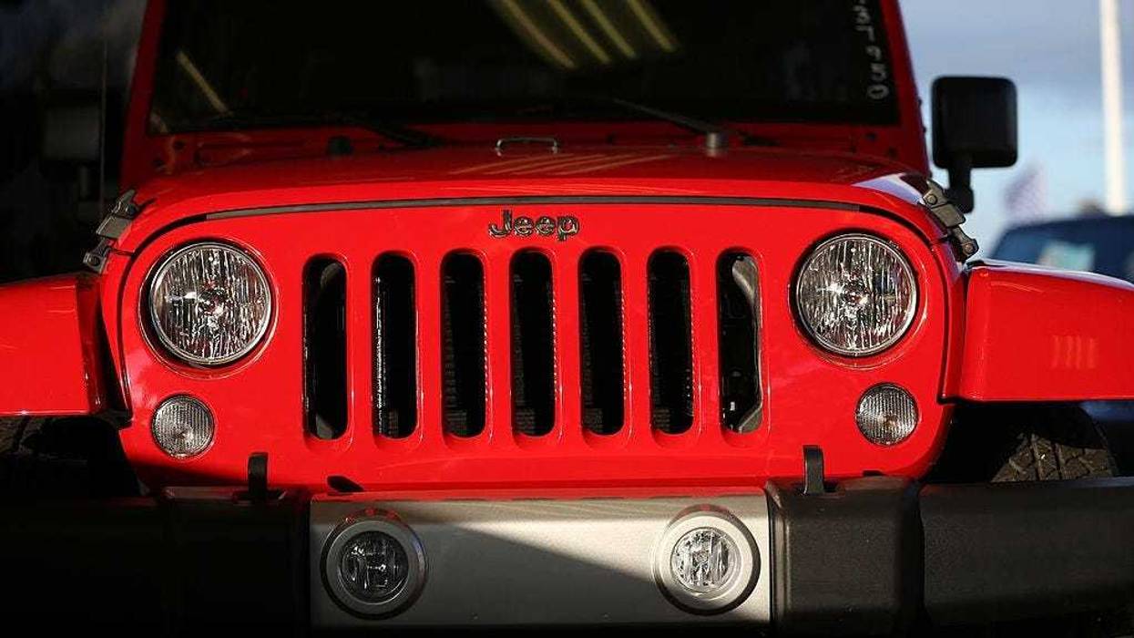 A Jeep Wrangler is displayed at the Hollywood Chrysler Jeep dealership on December 3, 2013 in Hollywood, Florida.