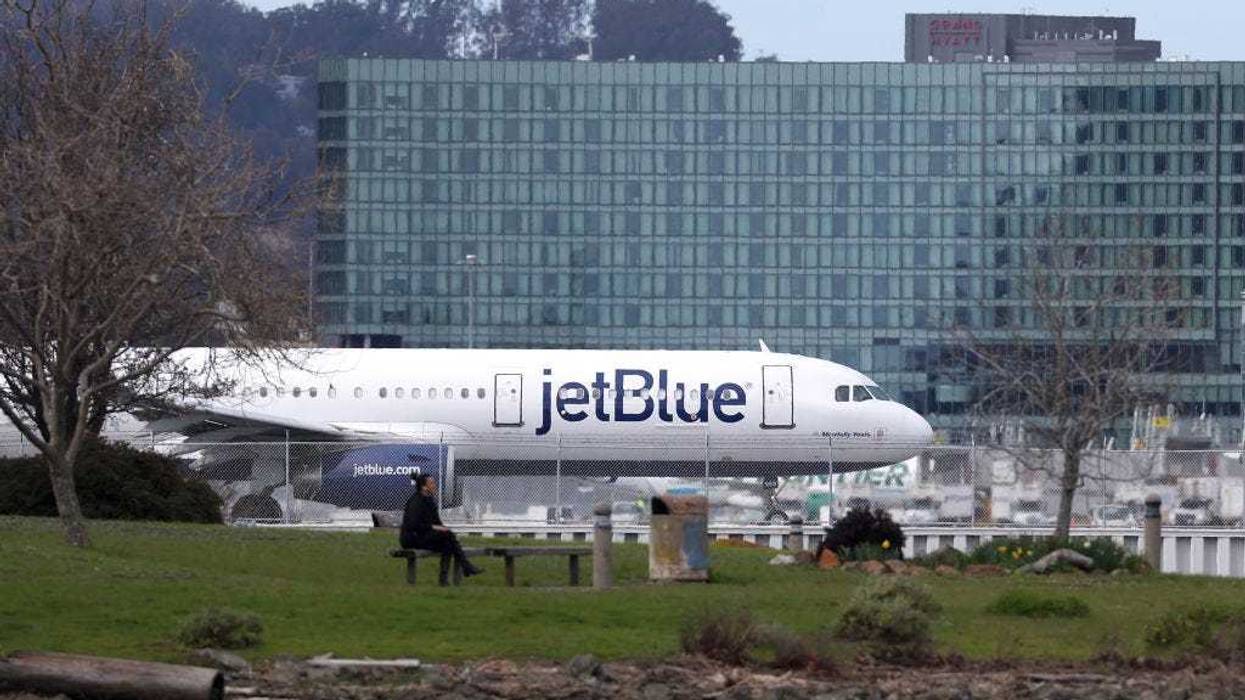 A JetBlue Airways plane prepares to take off from San Francisco International Airport on March 07, 2023 in San Francisco, California. The U.S. Justice Department has sued to block JetBlue Airways proposed $3.8 billion takeover of Spirit Airlines to prevent industry consolidation.