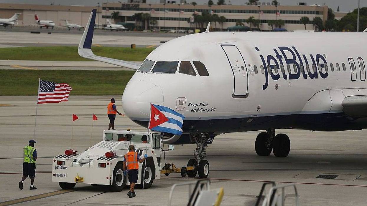A JetBlue flight was delayed on Monday after a woman allegedly made a false bomb threat.
