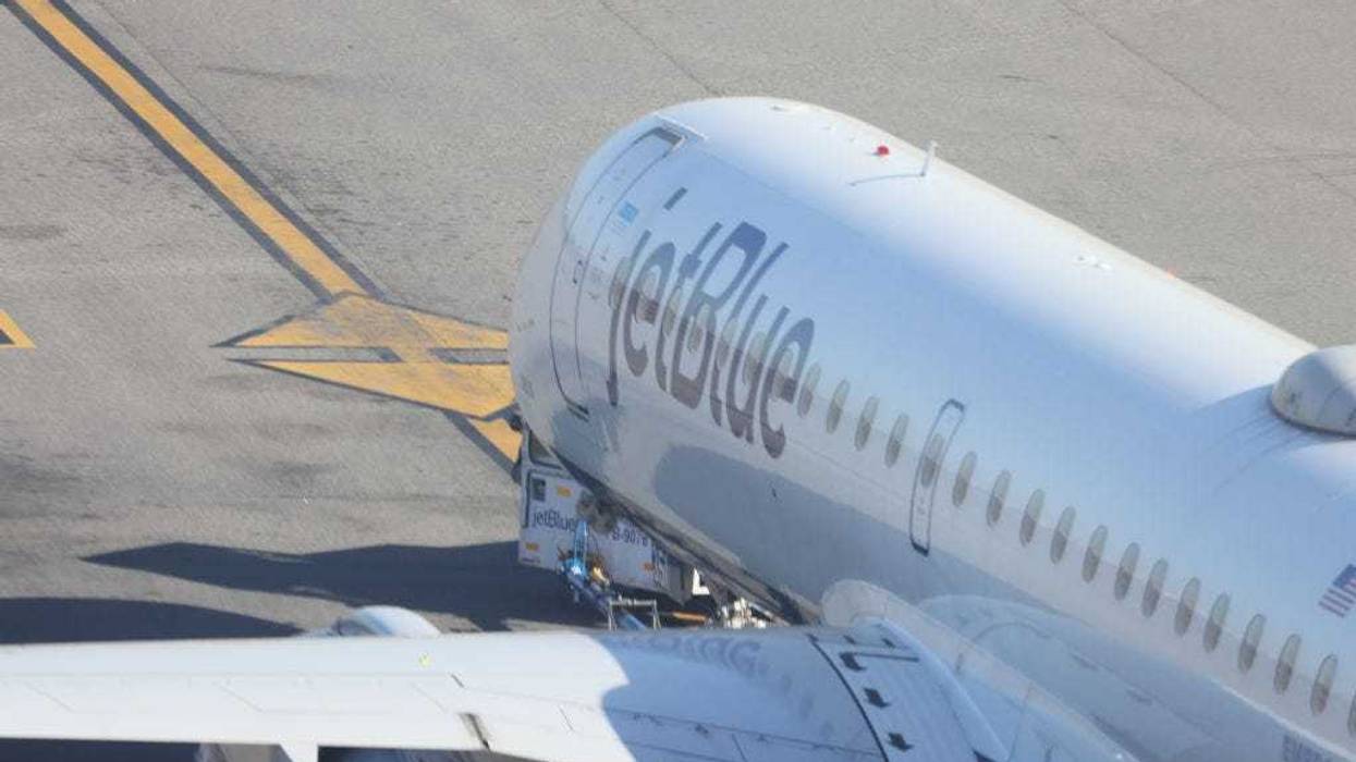 A JetBlue jet moves along the runway at Laguardia AIrport on November 10, 2022 in the Queens borough of New York City. The airline industry has rebounded this year and is looking forward to a busy holiday season.