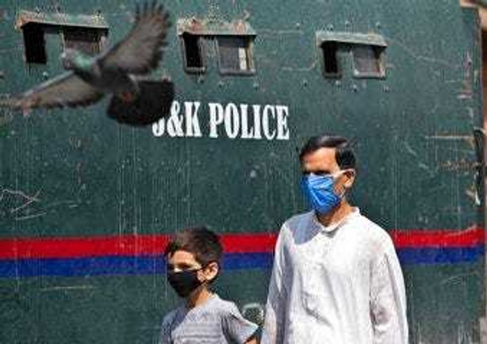 US Grapples With Pandemic as Its Origins Are Traced in China