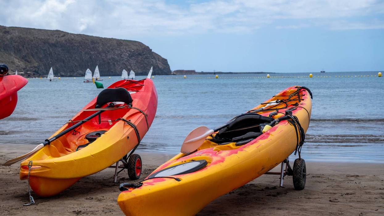A kayaker was taken to a hospital Sunday after a shark he caught bit him twice off Paradise Cove in Malibu. Los Angeles County firefighters treated it as a fishing accident, not an unprovoked attack, and the beach stayed open.