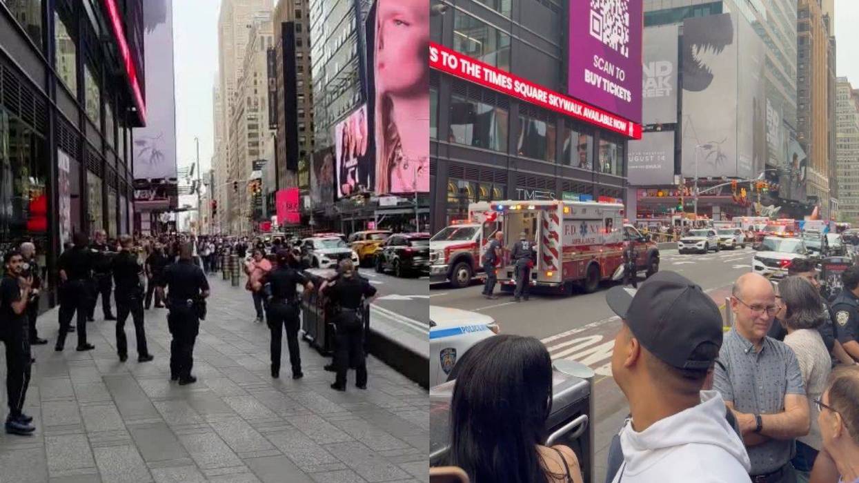 A knife-wielding woman was shot by police in Times Square on Monday, sources confirmed to 1010 WINS.