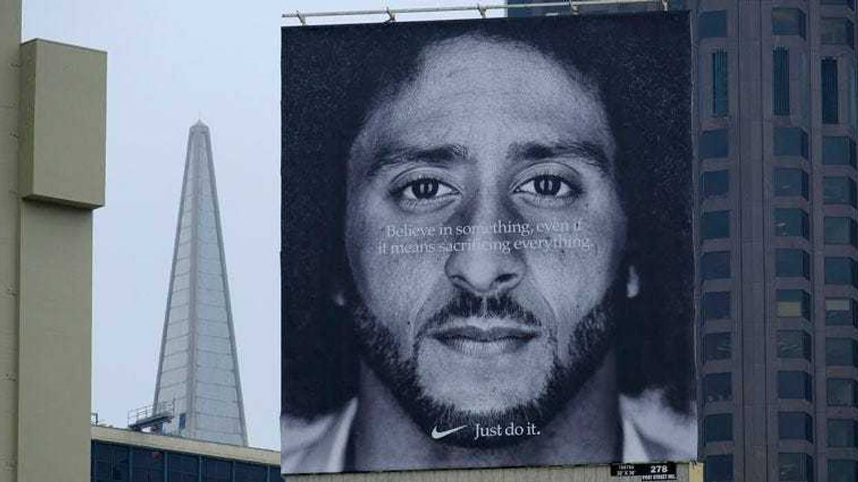 A large billboard stands on top of a Nike store showing former San Francisco 49ers quarterback Colin Kaepernick at Union Square in San Francisco.