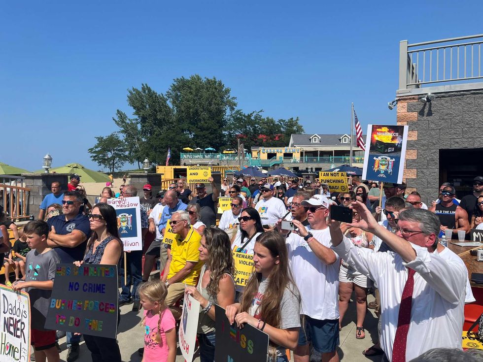 A large crowd of families who have family members working in the local prison systems came to Sunset Bay in Irving, N.Y. to stand with state legislators and law enforcement agencies to call for better treatment of correctional officers.