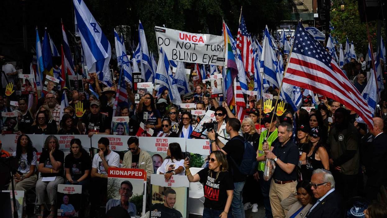 A large 'UNGA Do not turn a blind eye' sign is displayed at a rally calling on the United Nations to do more to release the hostages outside the United Nations Headquarters ahead of the General Assembly on September 20, 2024 in New York City. Rally speakers included the released hostage Aviva Segal as well as families of the hostages and New York Attorney General Letitia James.
