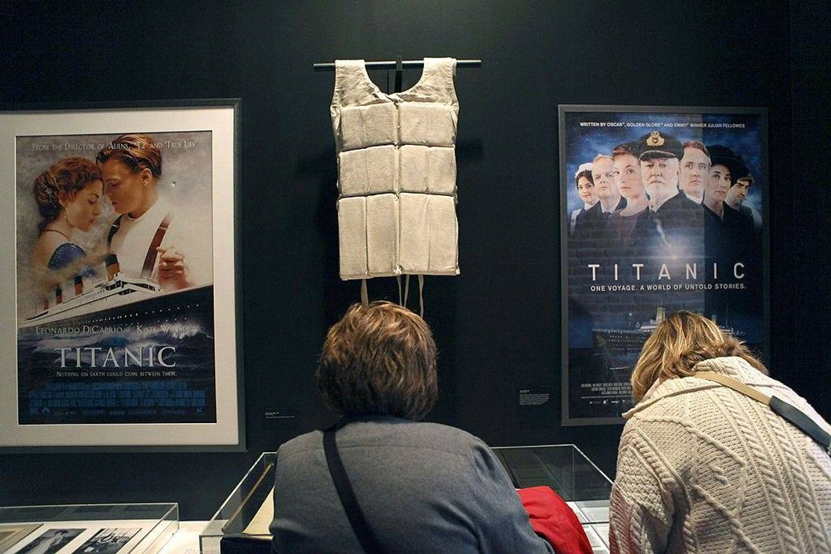 A life vest and posters from the 1997 movie "Titanic" hang on display